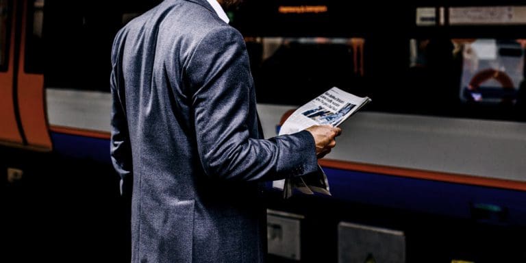 Man Reads Newsapaper